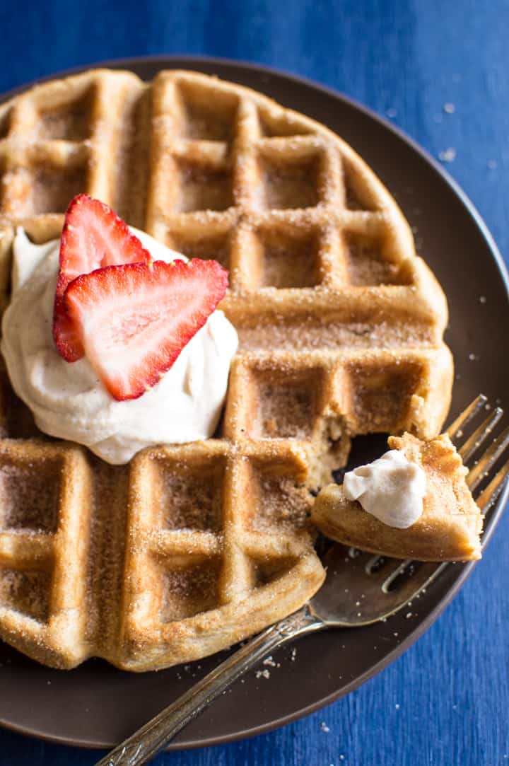 Churro Waffles with Cayenne Whipped Cream - delicious waffles sprinkled generously with cinnamon and sugar, and topped with a homemade cayenne cinnamon whipped cream. Perfect for brunch! | webserie.futebolmilionario.com