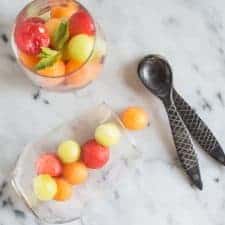 NATURALLY-SWEETENED Vodka Infused Melon Balls - this refreshing dessert is infused with pear juice and coconut sugar. Perfect for a picnic or BBQ!