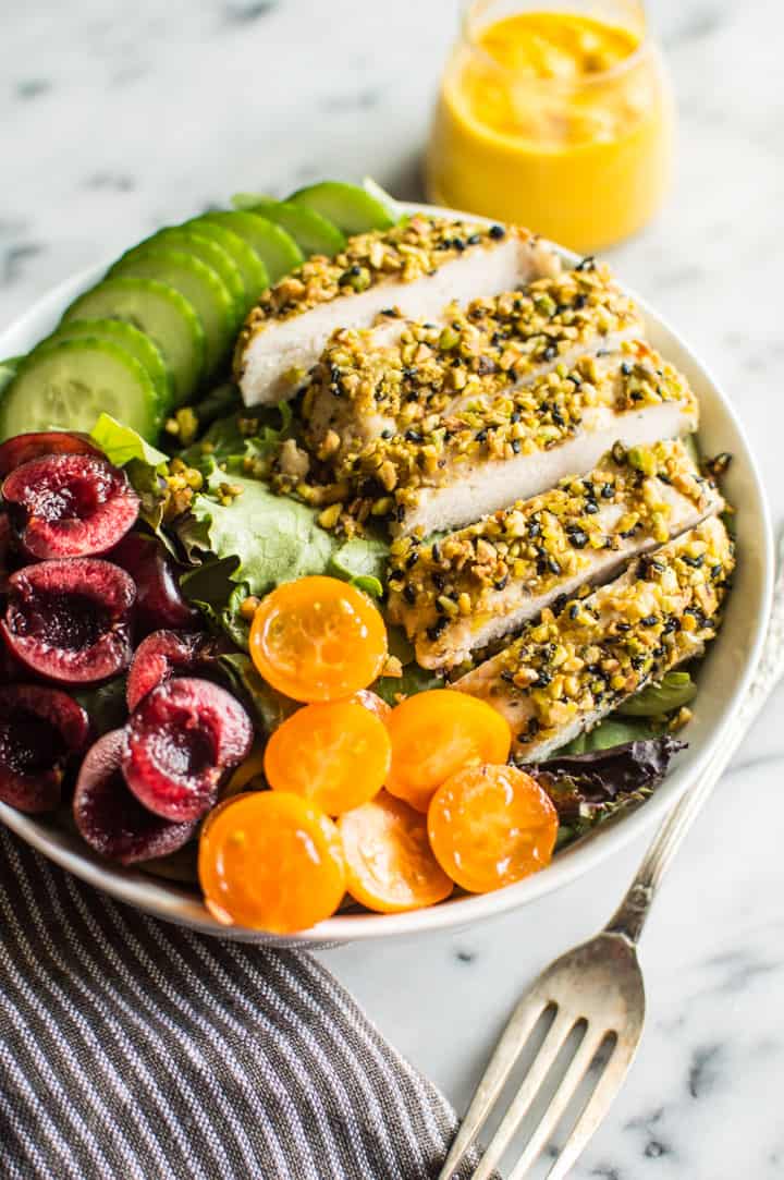 Pistachio Crusted Chicken Salad with Carrot Ginger Dressing - this gluten-free and paleo salad is perfect for weeknights. Ready in 30 minutes! | webserie.futebolmilionario.com