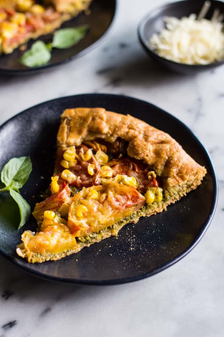 Gluten-Free Heirloom Tomato Galette with Kale Pesto - a delicious savory galette with a flaky gluten-free crust! | webserie.futebolmilionario.com