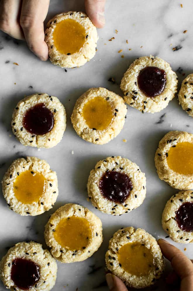 Easy Gluten-Free Coconut Thumbprint Cookies that are made with less than 10 ingredients! by Lisa Lin of webserie.futebolmilionario.com